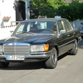 black merc Germany side view with our SL in the background